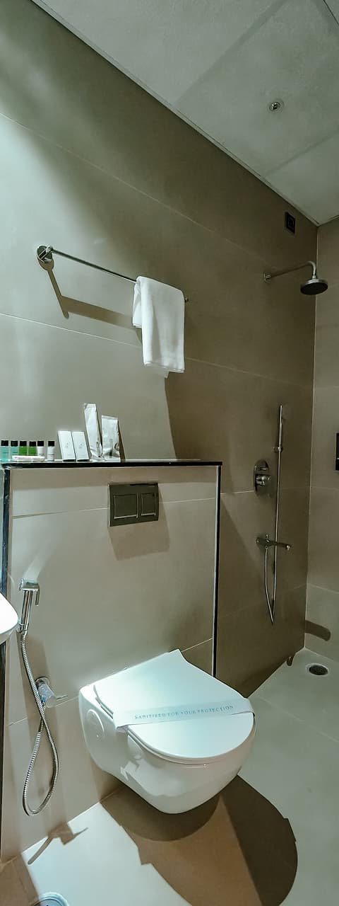 Clean bathroom at BKS Grand Hotel, Kodigehalli, Bengaluru